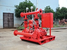 How does the advanced control system ensure stable fire pump performance?